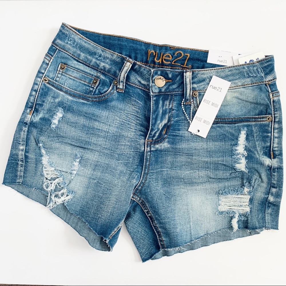 Ladies Rue21 mid-rise distressed jean shorts